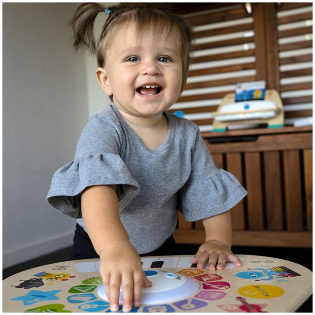 BABY EINSTEIN BY HAPE CLEVER COMPOSER WOODEN ACTIVITY TABLE